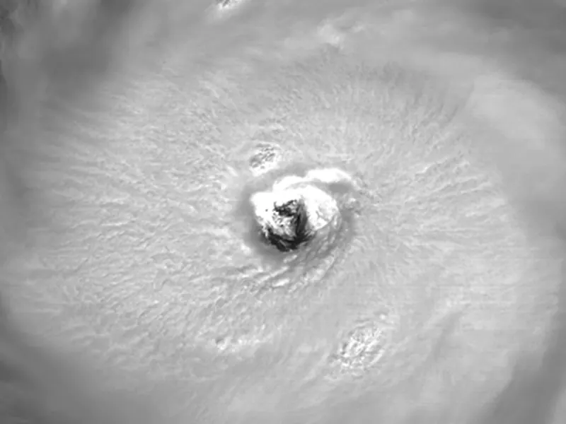 A satellite view of a hurricane with a very round, clear eye