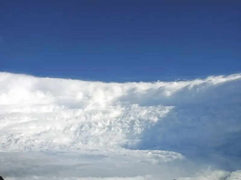 A view from a plane across the clear eye of a hurricane
