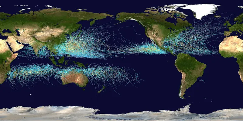 A world map covered in coloured lines showing where tropical cyclones have travelled, thickest in the tropics
